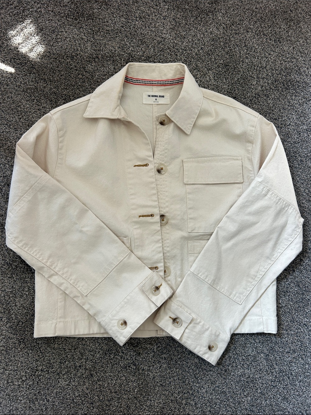 The Normal Brand cream Cropped Utility Jacket